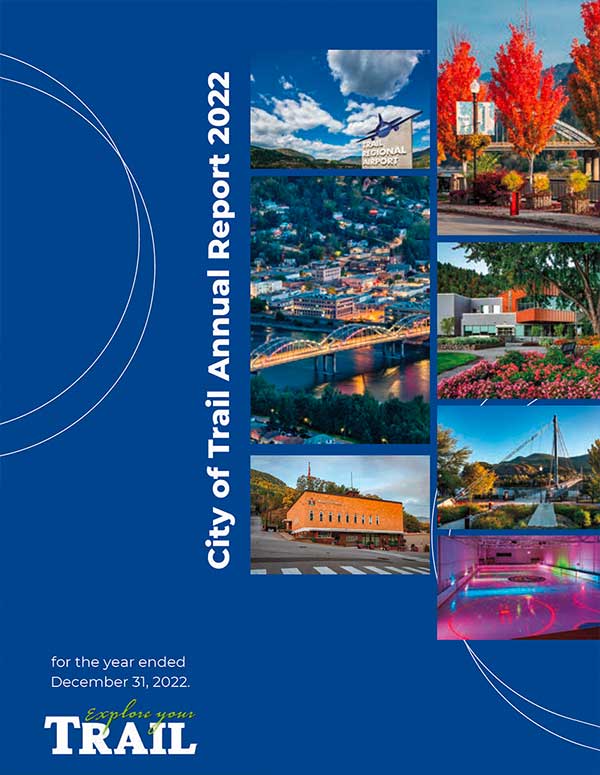 Cover of City of Trail 2022 Annual Report with six photos of cityscapes, buildings, and autumn trees on a blue background.