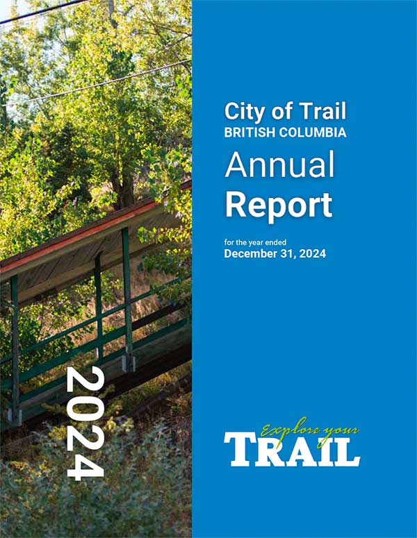 Bridge over a wooded area with green trees and sunlight, next to blue panel with City of Trail Annual Report text.